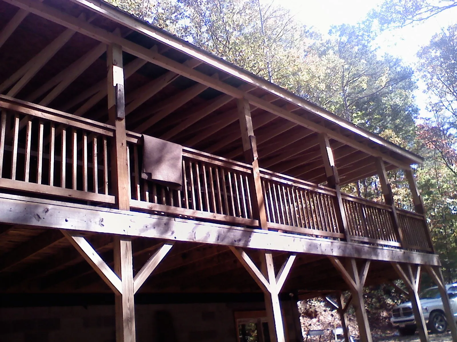 Timber framing under a new elevated porch and deck — Roof Leak Repair in Tremonton by Roofing Brothers